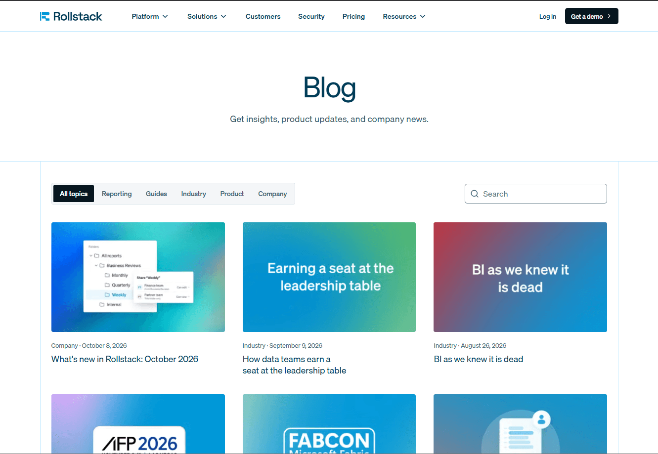 Rollstack blog page with topic filters, search, and featured articles